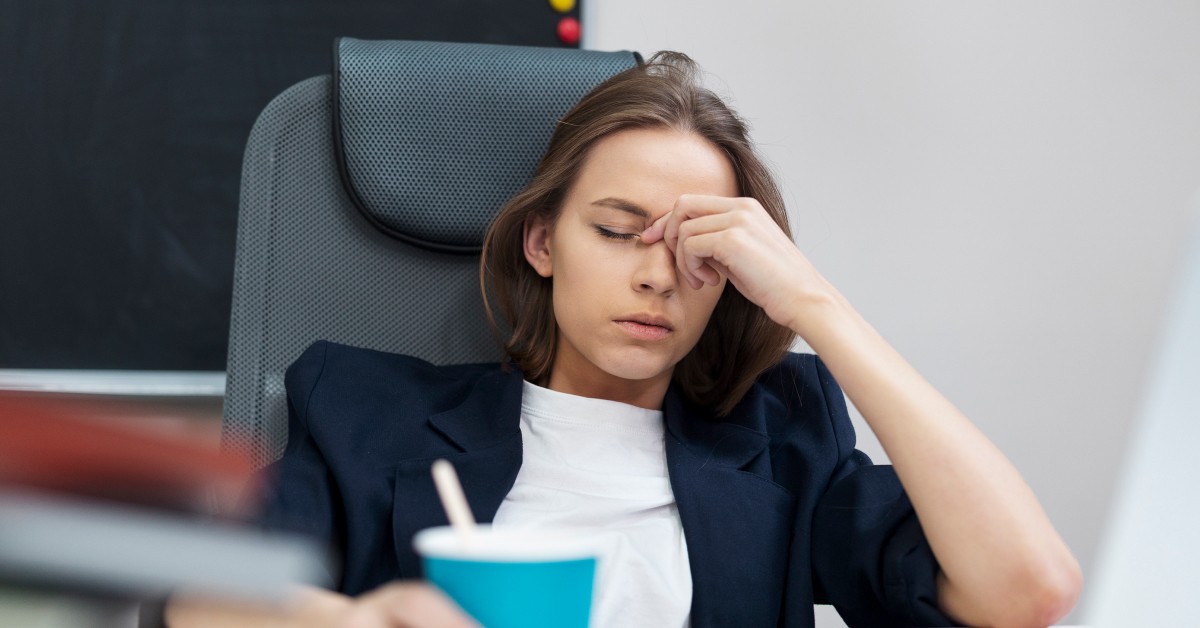 žena sa bolom u glavi